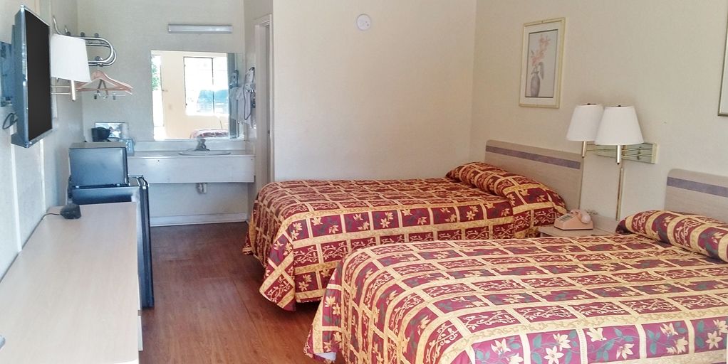 Americas Best Value Inn Tucker Rum bild